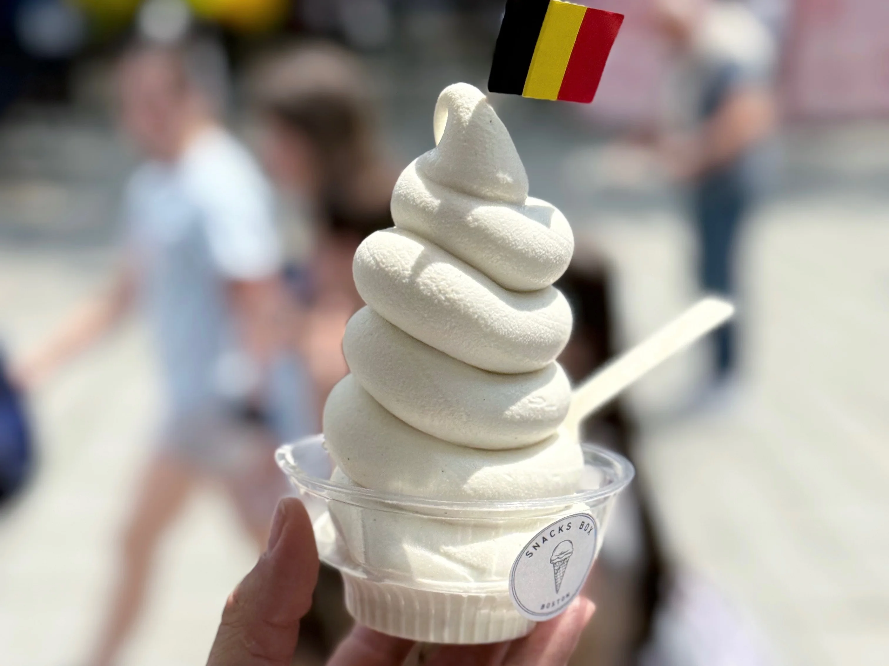 Chocolate and vanilla soft serve ice cream cone
